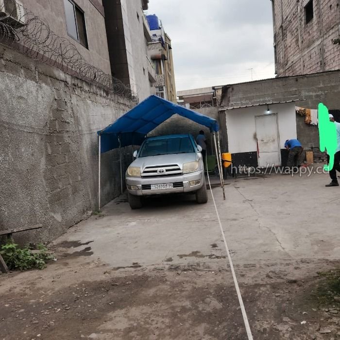 Parcelle sur macadam à Limete 1ère rue funa