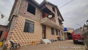 Parcelle incluant un immeuble de (R+1) à Bibwa