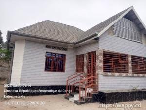 Parcelle de 400m² avec maison habitable