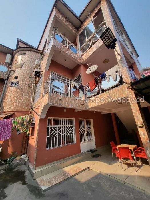 Parcelle avec immeuble R+3 à usage locatif
