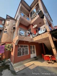 Parcelle avec immeuble R+3 à usage locatif