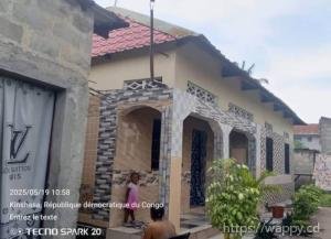 Parcelle avec trois maisons locatives