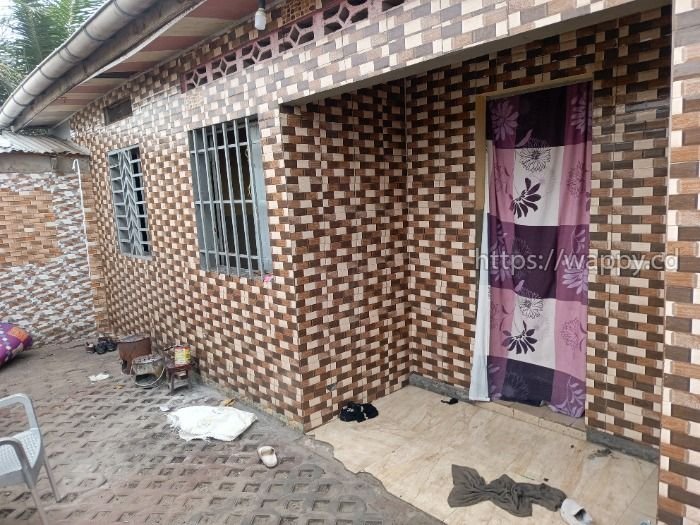 Parcelle avec trois maisons locatives