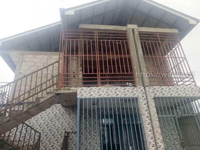 PARCELLE AVEC IMMEUBLE TYPE LOCATAIRES