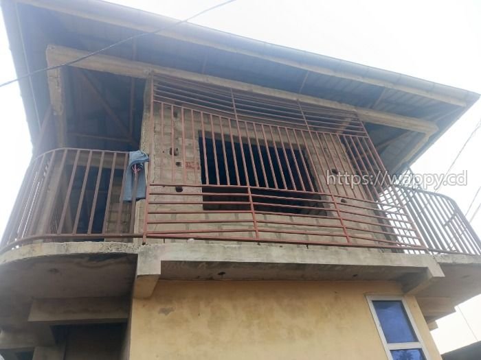 PARCELLE COMPRENANT UN IMMEUBLE LOCATIF DE 4 APPAR