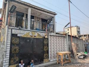 PARCELLE AVEC IMMEUBLE R+1 À BARUMBU