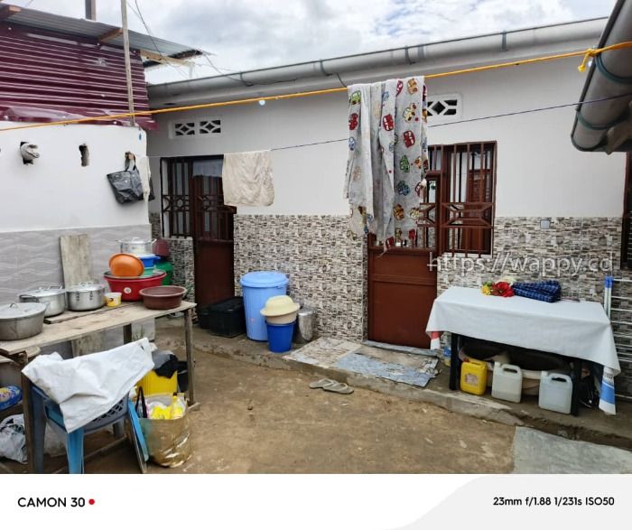 Parcelle avec maisons de type locatif
